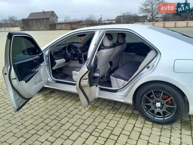 Сірий Тойота Камрі, об'ємом двигуна 2.5 л та пробігом 245 тис. км за 14100 $, фото 19 на Automoto.ua