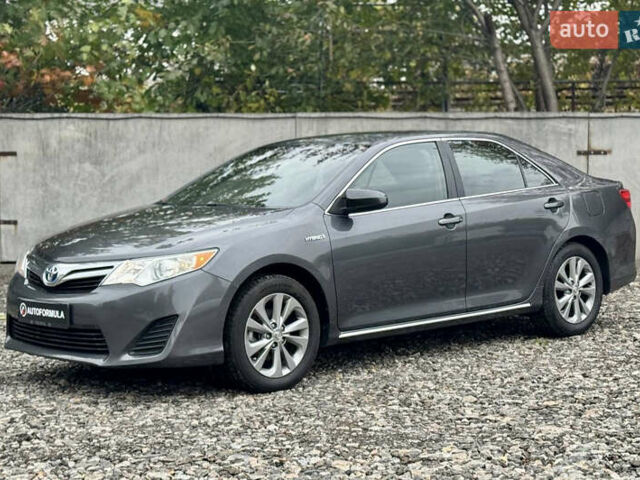 Сірий Тойота Камрі, об'ємом двигуна 2.49 л та пробігом 268 тис. км за 10990 $, фото 3 на Automoto.ua