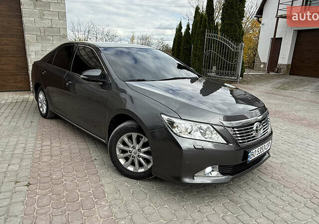 Серый Тойота Камри, объемом двигателя 2.49 л и пробегом 252 тыс. км за 11499 $, фото 1 на Automoto.ua