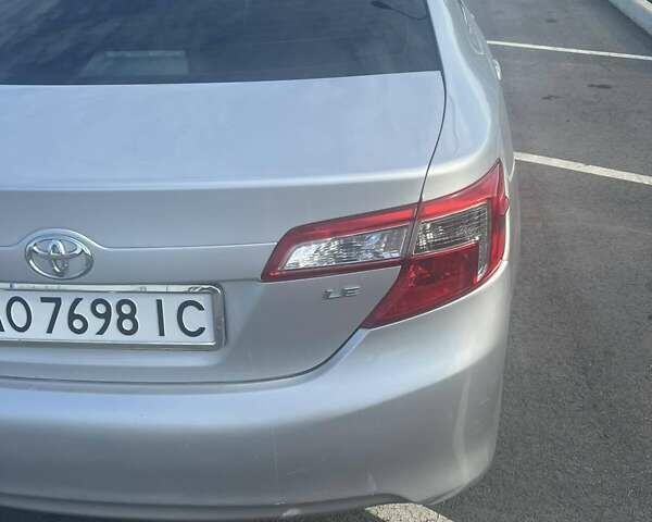 Серый Тойота Камри, объемом двигателя 2.49 л и пробегом 193 тыс. км за 10000 $, фото 20 на Automoto.ua