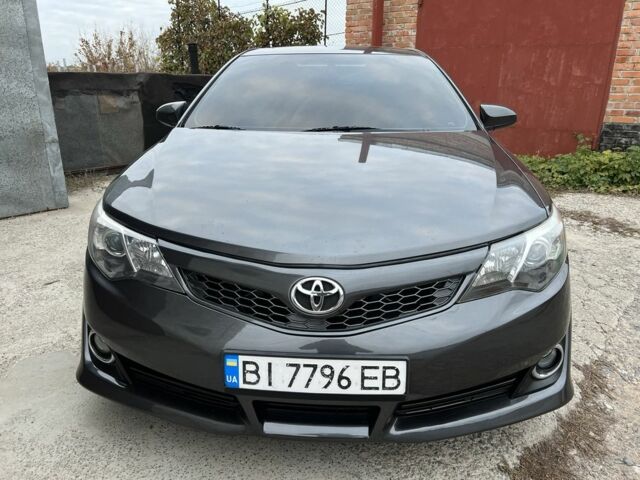 Серый Тойота Камри, объемом двигателя 2.5 л и пробегом 240 тыс. км за 8700 $, фото 7 на Automoto.ua