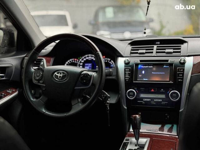 Серый Тойота Камри, объемом двигателя 2.5 л и пробегом 213 тыс. км за 14490 $, фото 42 на Automoto.ua