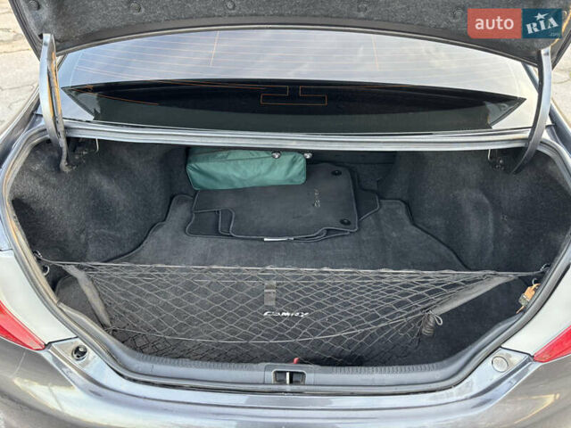 Сірий Тойота Камрі, об'ємом двигуна 2.49 л та пробігом 190 тис. км за 11800 $, фото 19 на Automoto.ua