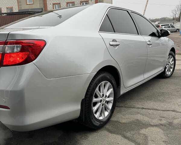 Серый Тойота Камри, объемом двигателя 2.49 л и пробегом 191 тыс. км за 13300 $, фото 14 на Automoto.ua