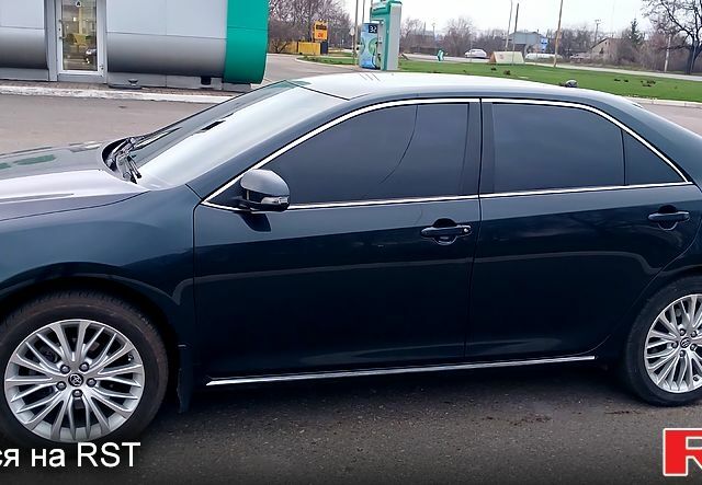 Серый Тойота Камри, объемом двигателя 2.5 л и пробегом 191 тыс. км за 14950 $, фото 2 на Automoto.ua