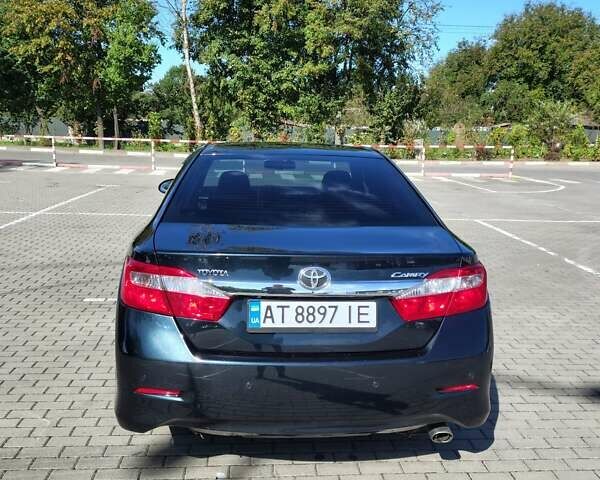 Сірий Тойота Камрі, об'ємом двигуна 2.5 л та пробігом 231 тис. км за 12500 $, фото 5 на Automoto.ua