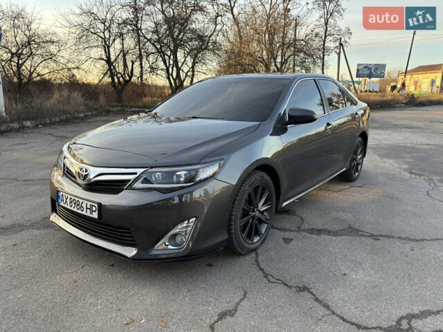 Сірий Тойота Камрі, об'ємом двигуна 2.49 л та пробігом 190 тис. км за 11800 $, фото 1 на Automoto.ua