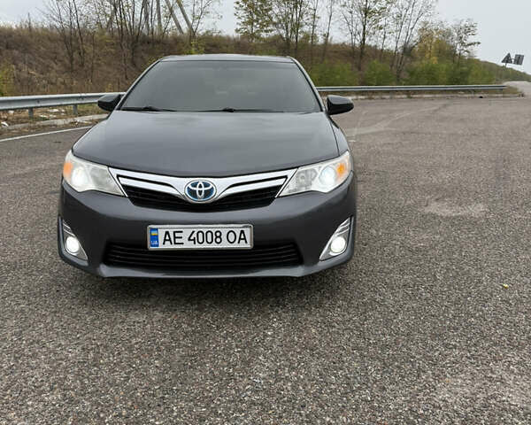 Серый Тойота Камри, объемом двигателя 2.49 л и пробегом 333 тыс. км за 11500 $, фото 1 на Automoto.ua