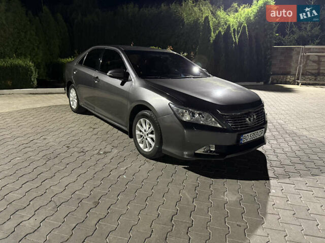 Сірий Тойота Камрі, об'ємом двигуна 2.49 л та пробігом 250 тис. км за 11299 $, фото 1 на Automoto.ua