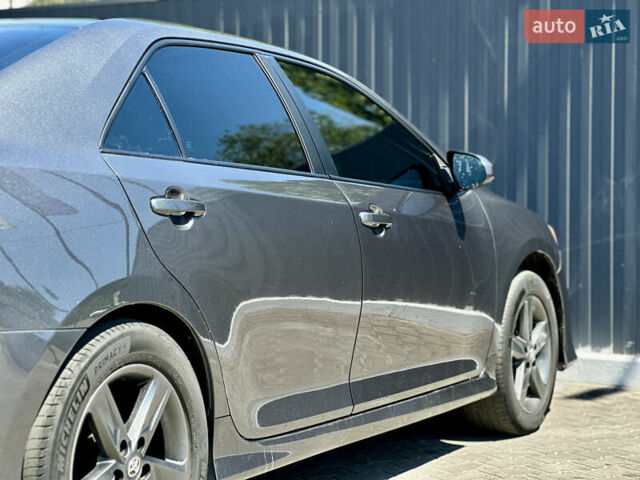 Сірий Тойота Камрі, об'ємом двигуна 2.49 л та пробігом 252 тис. км за 9800 $, фото 13 на Automoto.ua