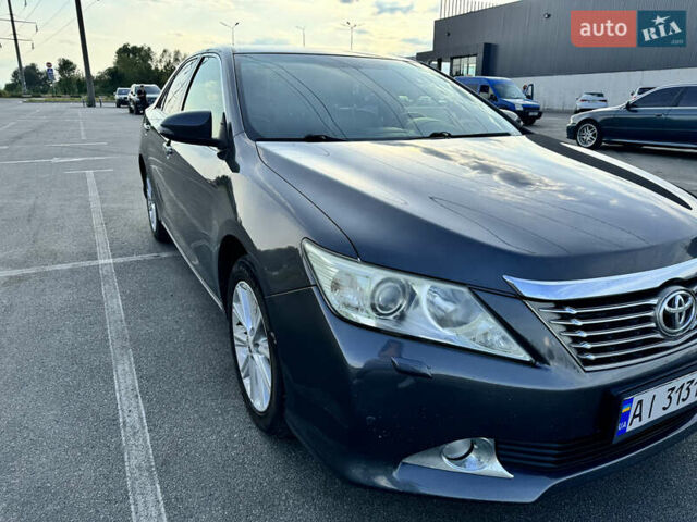 Серый Тойота Камри, объемом двигателя 2.49 л и пробегом 240 тыс. км за 12900 $, фото 1 на Automoto.ua