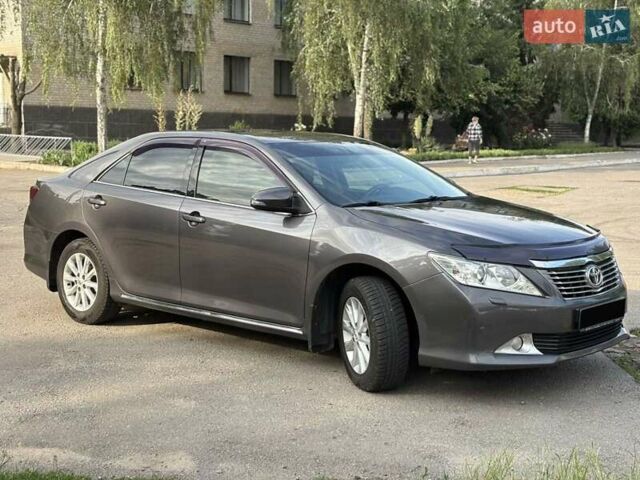 Серый Тойота Камри, объемом двигателя 2.49 л и пробегом 174 тыс. км за 14200 $, фото 15 на Automoto.ua