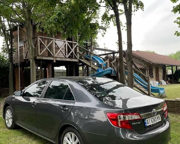 Серый Тойота Камри, объемом двигателя 2.49 л и пробегом 229 тыс. км за 12800 $, фото 12 на Automoto.ua