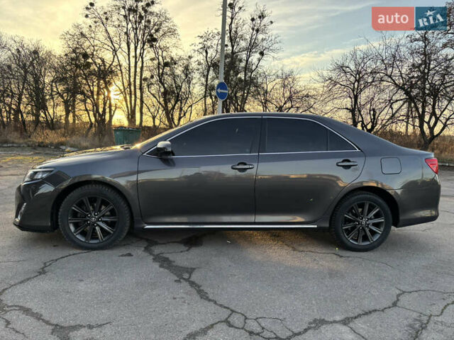 Сірий Тойота Камрі, об'ємом двигуна 2.49 л та пробігом 190 тис. км за 11800 $, фото 5 на Automoto.ua