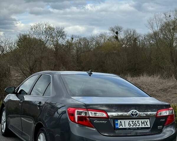 Серый Тойота Камри, объемом двигателя 2.49 л и пробегом 229 тыс. км за 12800 $, фото 10 на Automoto.ua