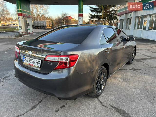Сірий Тойота Камрі, об'ємом двигуна 2.49 л та пробігом 190 тис. км за 11800 $, фото 3 на Automoto.ua