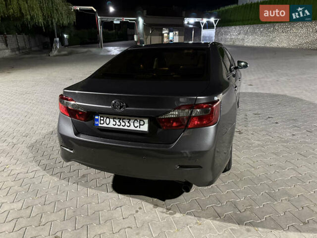 Сірий Тойота Камрі, об'ємом двигуна 2.49 л та пробігом 250 тис. км за 11299 $, фото 4 на Automoto.ua
