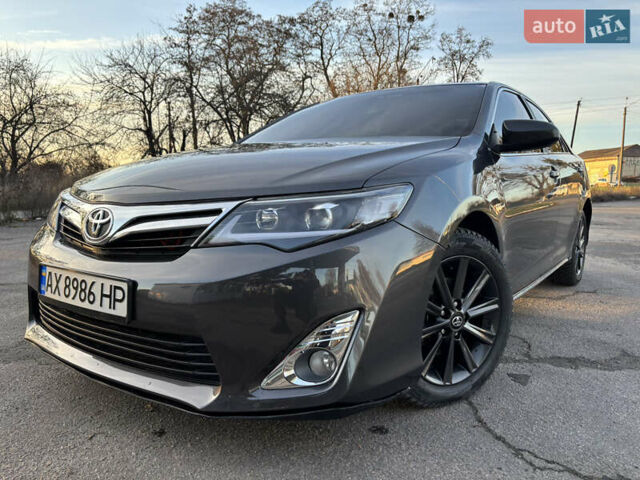 Сірий Тойота Камрі, об'ємом двигуна 2.49 л та пробігом 190 тис. км за 11800 $, фото 6 на Automoto.ua