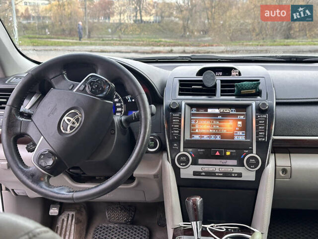 Сірий Тойота Камрі, об'ємом двигуна 2.49 л та пробігом 274 тис. км за 8000 $, фото 16 на Automoto.ua