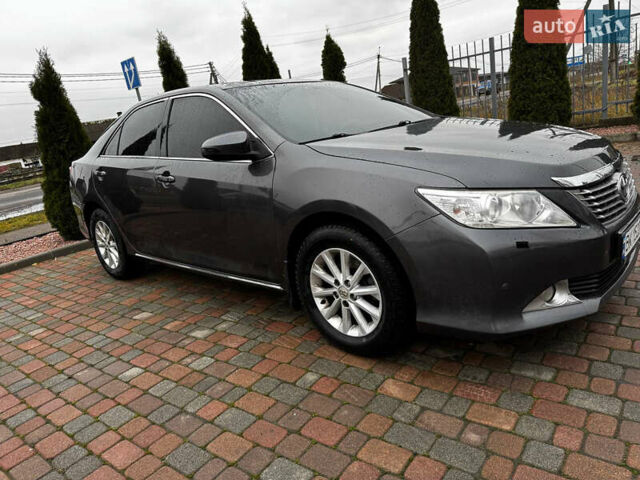 Серый Тойота Камри, объемом двигателя 2.49 л и пробегом 253 тыс. км за 10799 $, фото 3 на Automoto.ua