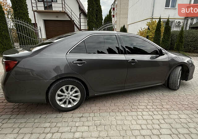 Серый Тойота Камри, объемом двигателя 2.49 л и пробегом 252 тыс. км за 11499 $, фото 2 на Automoto.ua