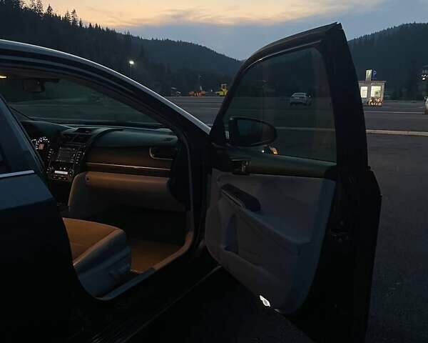 Серый Тойота Камри, объемом двигателя 2.49 л и пробегом 229 тыс. км за 12800 $, фото 21 на Automoto.ua