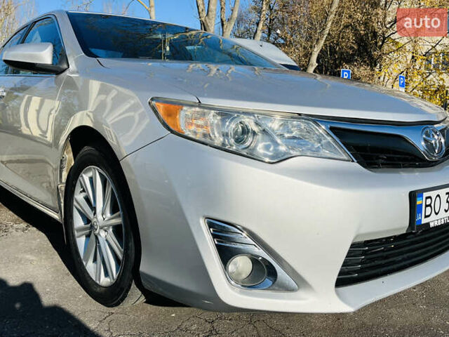 Серый Тойота Камри, объемом двигателя 2.5 л и пробегом 155 тыс. км за 13000 $, фото 2 на Automoto.ua