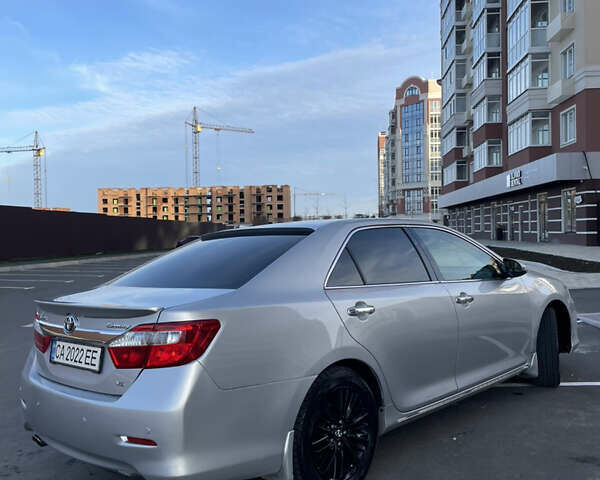 Сірий Тойота Камрі, об'ємом двигуна 3.5 л та пробігом 231 тис. км за 13400 $, фото 1 на Automoto.ua