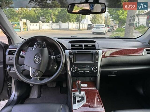 Серый Тойота Камри, объемом двигателя 2.49 л и пробегом 174 тыс. км за 14200 $, фото 14 на Automoto.ua