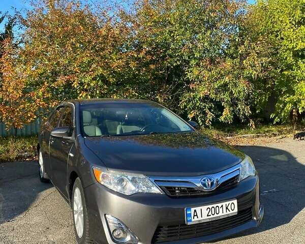 Сірий Тойота Камрі, об'ємом двигуна 2.49 л та пробігом 135 тис. км за 14900 $, фото 1 на Automoto.ua