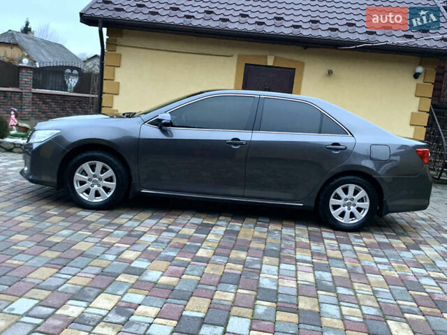 Сірий Тойота Камрі, об'ємом двигуна 2.49 л та пробігом 225 тис. км за 12800 $, фото 21 на Automoto.ua