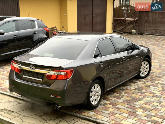 Сірий Тойота Камрі, об'ємом двигуна 2.49 л та пробігом 225 тис. км за 12800 $, фото 13 на Automoto.ua