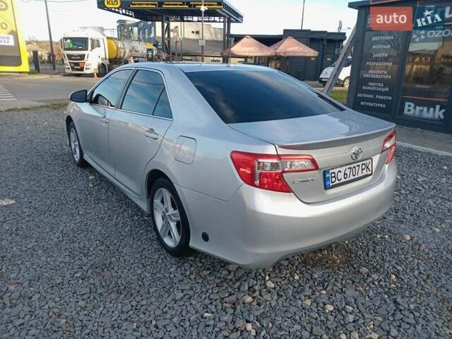 Серый Тойота Камри, объемом двигателя 2.49 л и пробегом 230 тыс. км за 9800 $, фото 13 на Automoto.ua