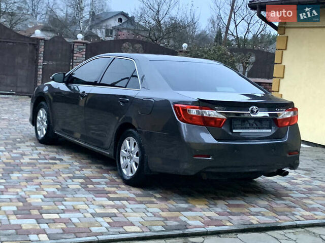 Сірий Тойота Камрі, об'ємом двигуна 2.49 л та пробігом 225 тис. км за 12800 $, фото 20 на Automoto.ua
