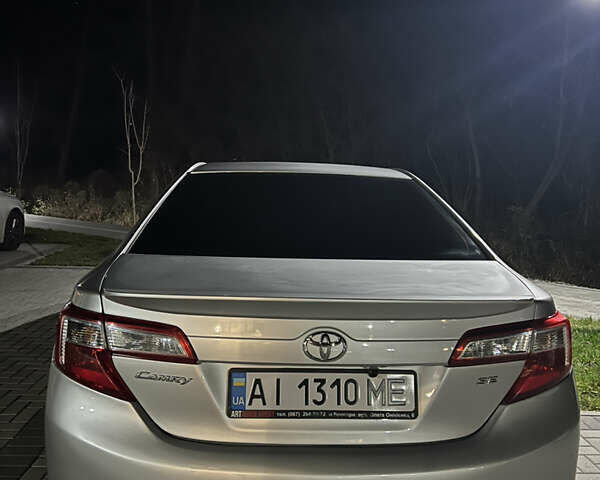 Серый Тойота Камри, объемом двигателя 2.49 л и пробегом 193 тыс. км за 11000 $, фото 16 на Automoto.ua