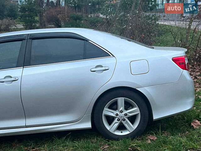 Сірий Тойота Камрі, об'ємом двигуна 2.5 л та пробігом 297 тис. км за 10390 $, фото 6 на Automoto.ua