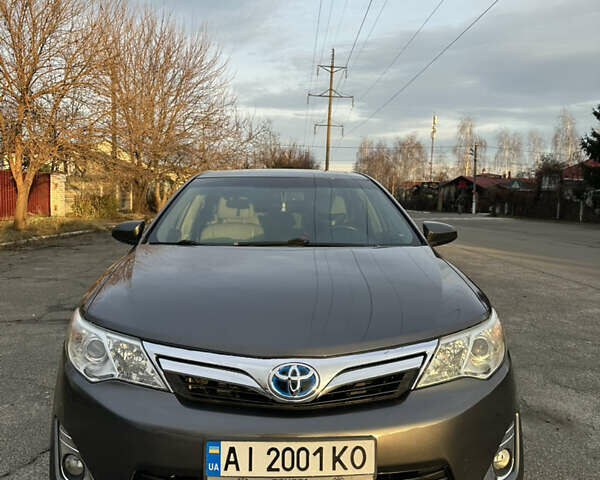 Серый Тойота Камри, объемом двигателя 2.49 л и пробегом 135 тыс. км за 14200 $, фото 1 на Automoto.ua