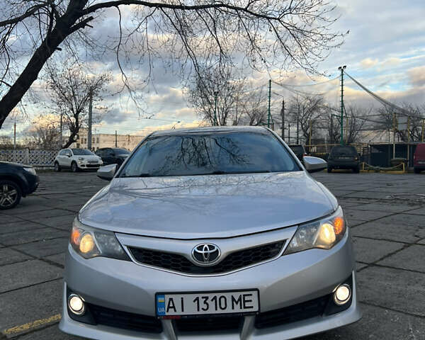Серый Тойота Камри, объемом двигателя 2.49 л и пробегом 193 тыс. км за 11000 $, фото 1 на Automoto.ua