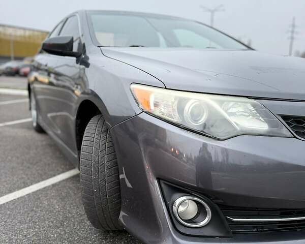 Сірий Тойота Камрі, об'ємом двигуна 2.49 л та пробігом 230 тис. км за 11000 $, фото 7 на Automoto.ua