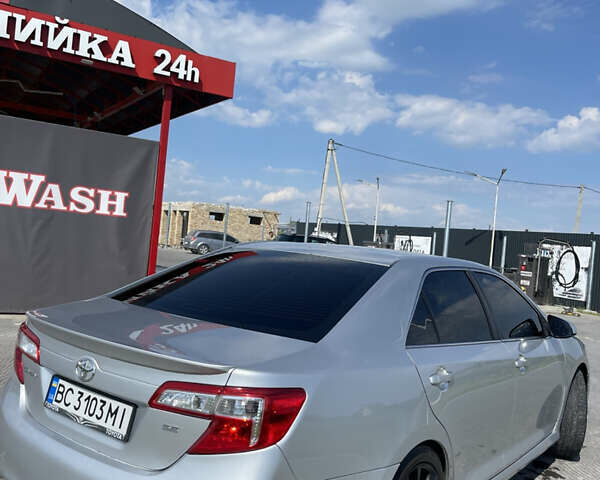 Серый Тойота Камри, объемом двигателя 2.5 л и пробегом 255 тыс. км за 11999 $, фото 4 на Automoto.ua