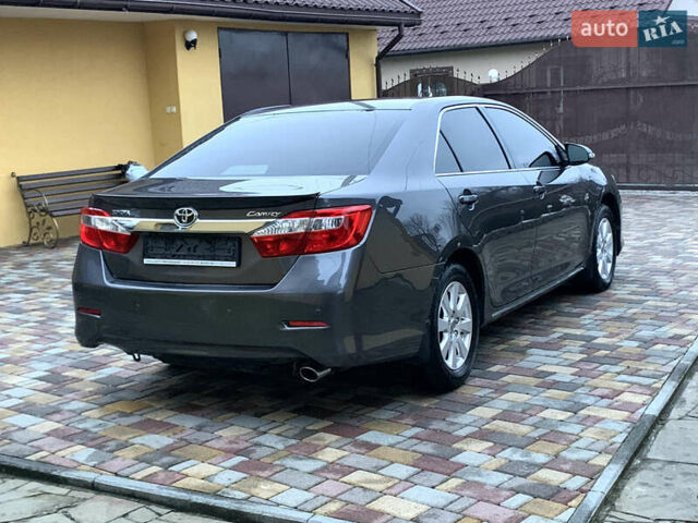 Сірий Тойота Камрі, об'ємом двигуна 2.49 л та пробігом 225 тис. км за 12800 $, фото 19 на Automoto.ua
