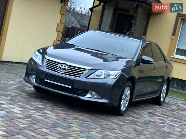 Сірий Тойота Камрі, об'ємом двигуна 2.49 л та пробігом 225 тис. км за 12800 $, фото 18 на Automoto.ua