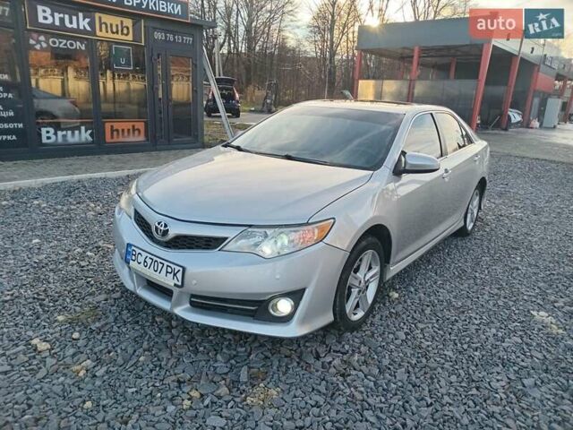 Серый Тойота Камри, объемом двигателя 2.49 л и пробегом 230 тыс. км за 9800 $, фото 2 на Automoto.ua