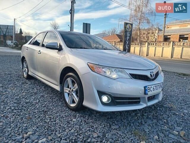 Серый Тойота Камри, объемом двигателя 2.49 л и пробегом 230 тыс. км за 9800 $, фото 1 на Automoto.ua