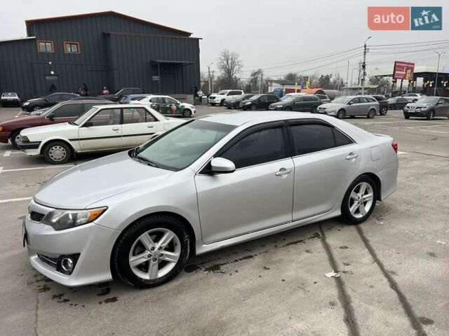 Серый Тойота Камри, объемом двигателя 2.5 л и пробегом 297 тыс. км за 10300 $, фото 11 на Automoto.ua