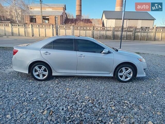 Серый Тойота Камри, объемом двигателя 2.49 л и пробегом 230 тыс. км за 9800 $, фото 12 на Automoto.ua