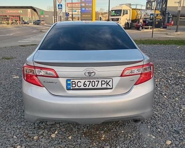 Серый Тойота Камри, объемом двигателя 2.49 л и пробегом 230 тыс. км за 9800 $, фото 6 на Automoto.ua