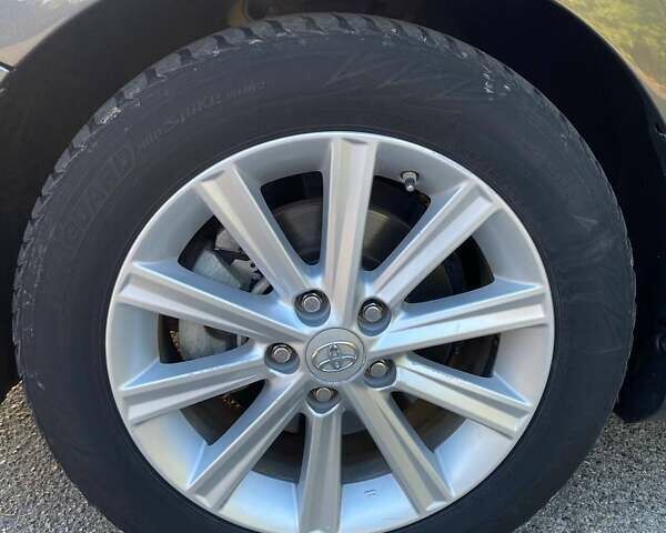 Сірий Тойота Камрі, об'ємом двигуна 2.49 л та пробігом 135 тис. км за 14900 $, фото 7 на Automoto.ua