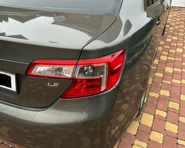 Серый Тойота Камри, объемом двигателя 2.5 л и пробегом 190 тыс. км за 11800 $, фото 3 на Automoto.ua