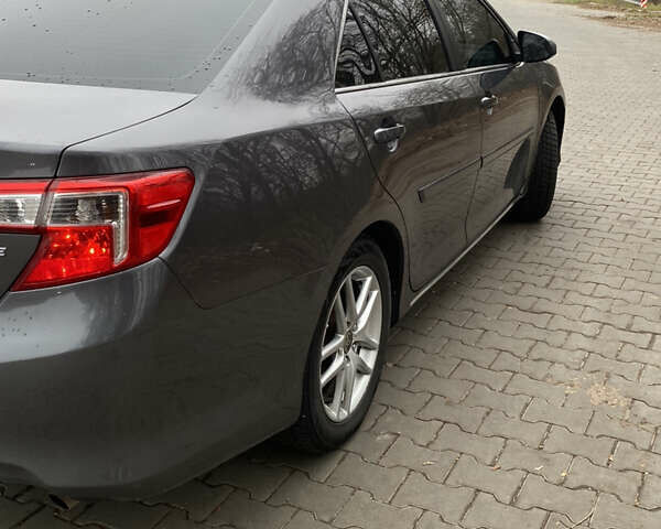 Сірий Тойота Камрі, об'ємом двигуна 2.4 л та пробігом 241 тис. км за 12600 $, фото 5 на Automoto.ua